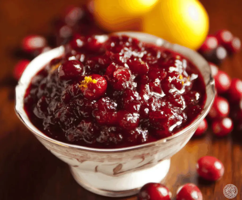 Fresh cranberry sauce with orange marmalade served in a bowl for a festive holiday recipe.
