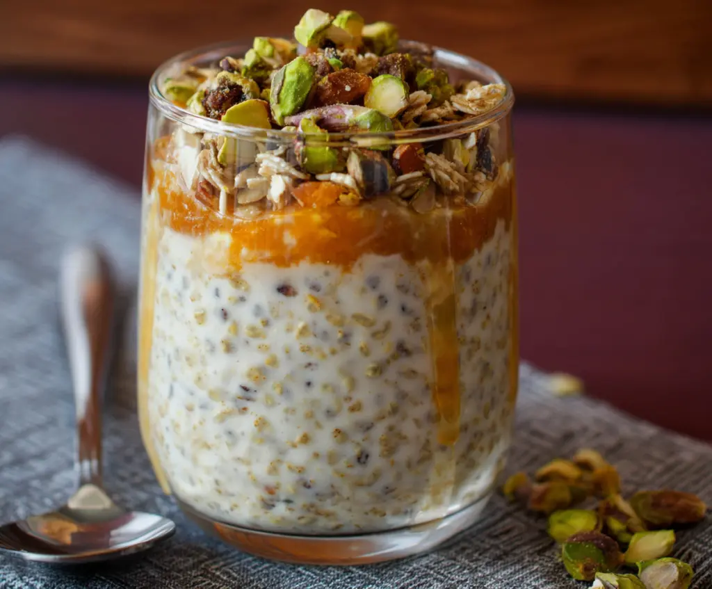 Delicious Baklava Overnight Oats topped with nuts and honey for a nutritious breakfast