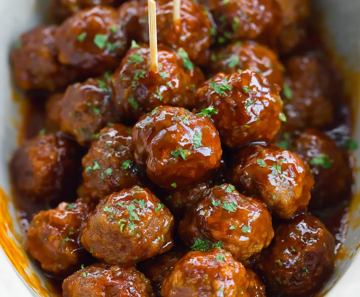 Delicious slow cooker honey buffalo meatballs served in a bowl, showcasing a perfect blend of sweet and spicy flavors.