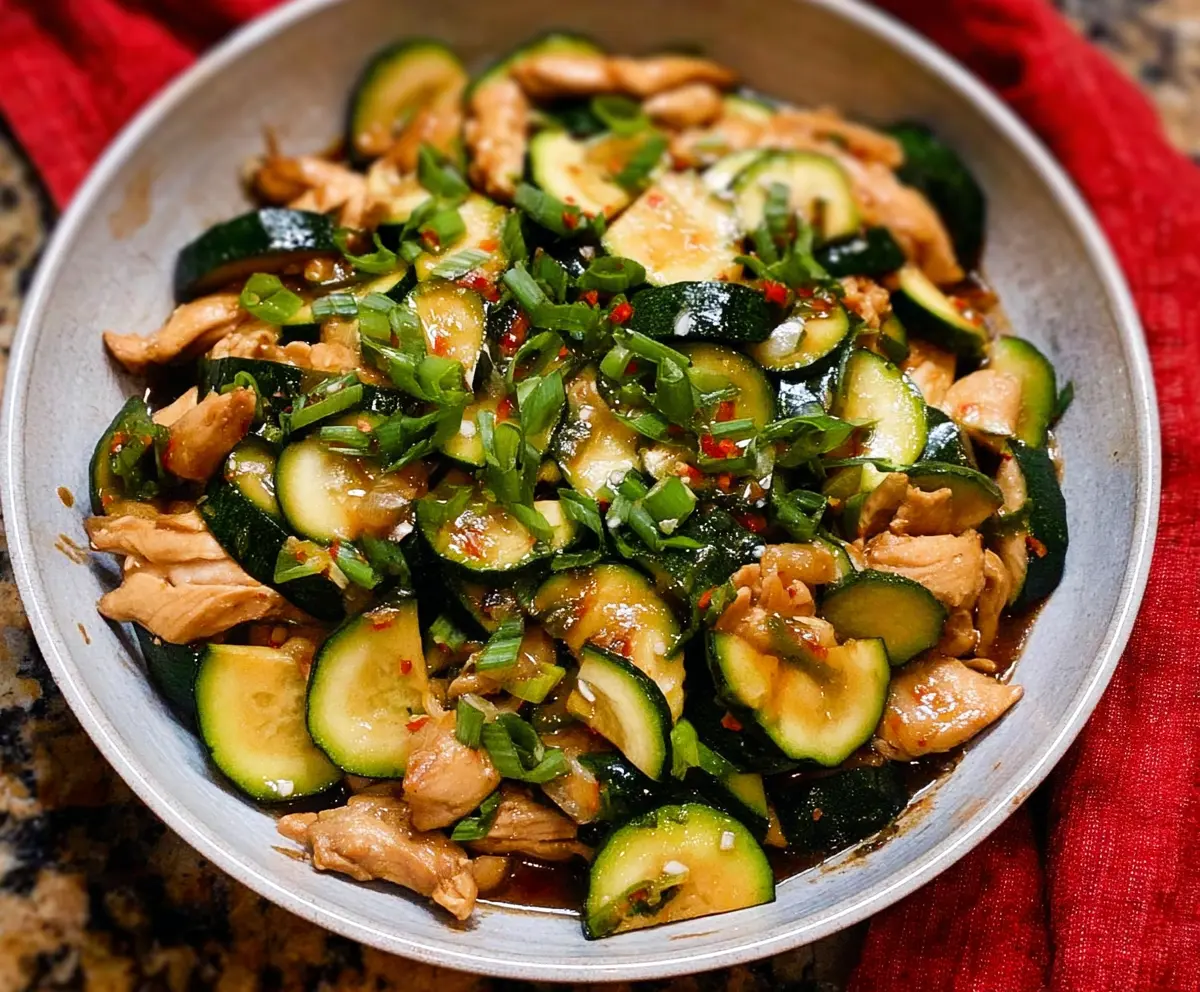 Delicious chicken zucchini stir fry with colorful vegetables and herbs, perfect for a healthy meal